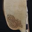 Oak leaf fender tooling on roughout fender.